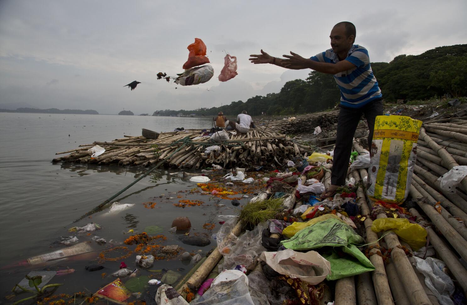 Delegates working to end global plastics pollution agree to craft a